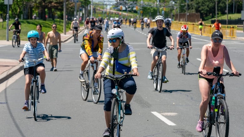 Cyclists on closed Lakeshore Blvd as part of ActiveTO program. © Toronto Star