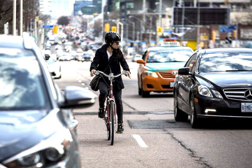 Toronto Council votes 18-5 in favour of redesigning a section of Yonge St. including protected bicycle lanes. ©