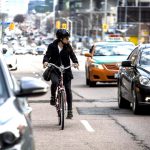 Toronto Council votes 18-5 in favour of redesigning a section of Yonge St. including protected bicycle lanes. ©